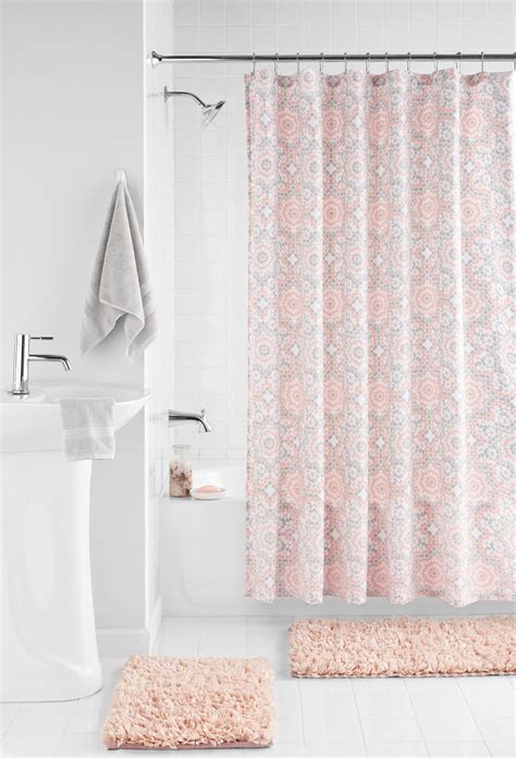 Matching fabric-covered shower curtain rings fit a standard curtain rod. . Shower curtains with matching rugs